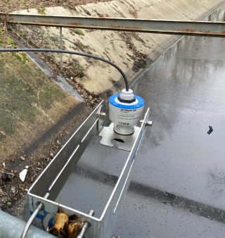 Level measurement of an open sewage canal with the OPTIWAVE 1540