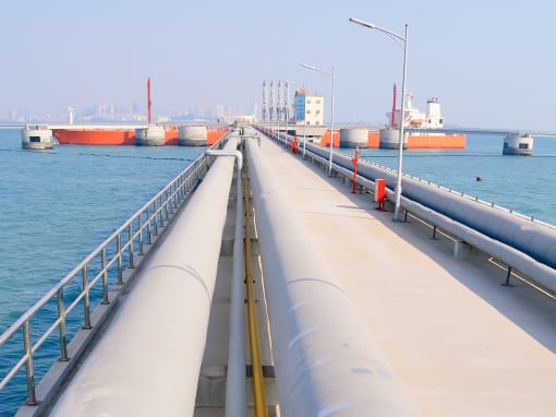 Pipeline at the sea dock supplies an oil tanker