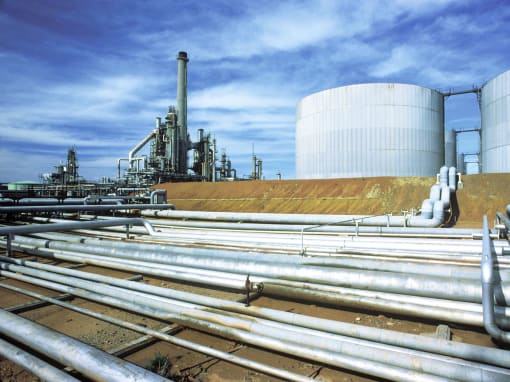 Steel pipelines in front of an industrial plant