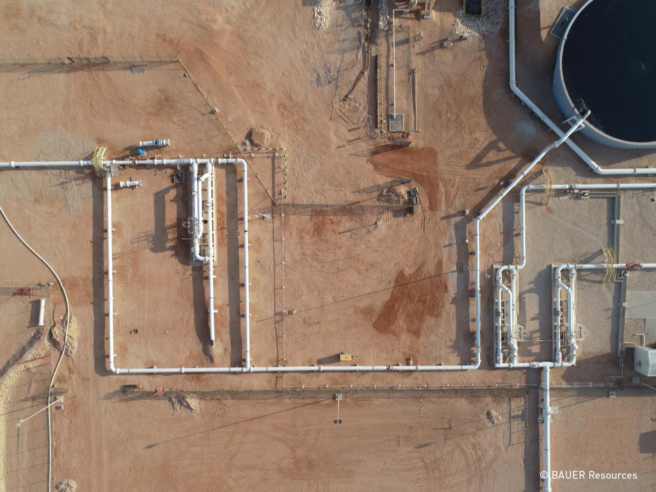 Wastewater treatment plant with water skids from above