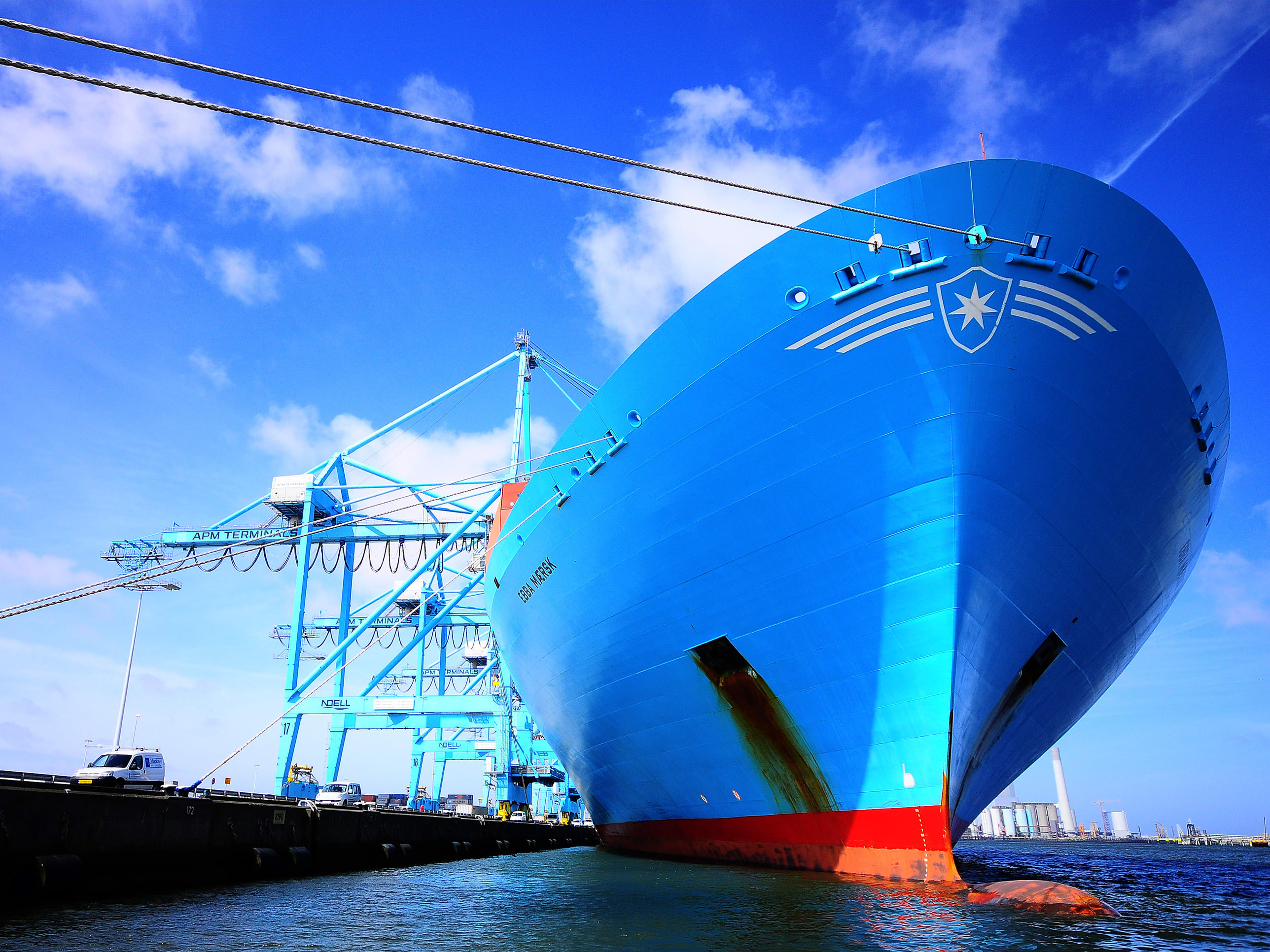 Marine industry Blue container ship in harbour