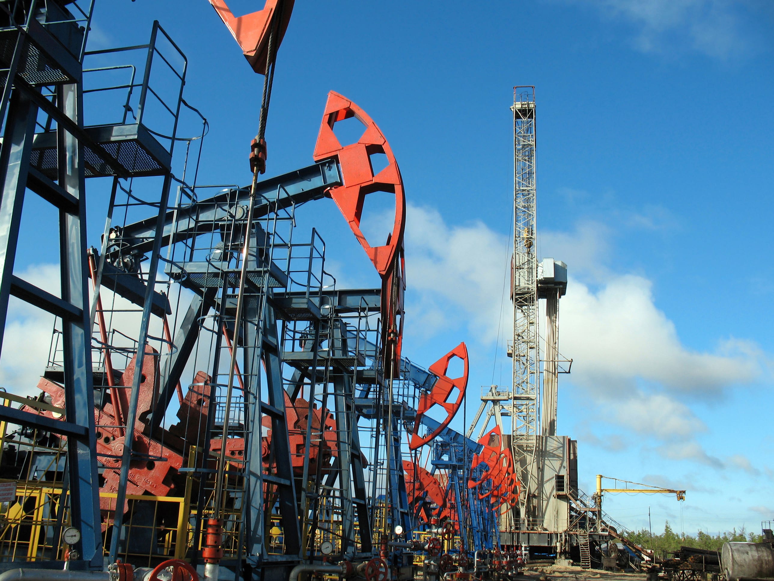 Exploration & production in the oil & gas industry Pumpjacks on an oil field